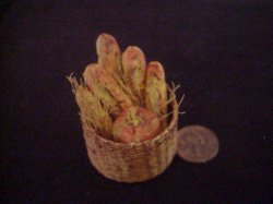 assorted bread in tall basket