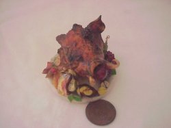 Boar's Head on platter with fruit