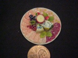 assorted salami, mortadella,cheese on porcelain