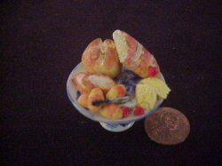 porcelain blue willow display assorted bread
