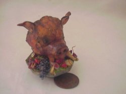 Boar's Head on porcelain platter with fruit
