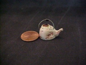 porcelain faux rusty teapot