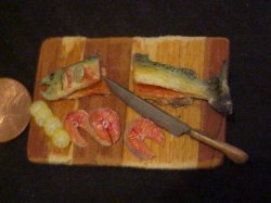 cut whole salmon on wooden board & knife 3